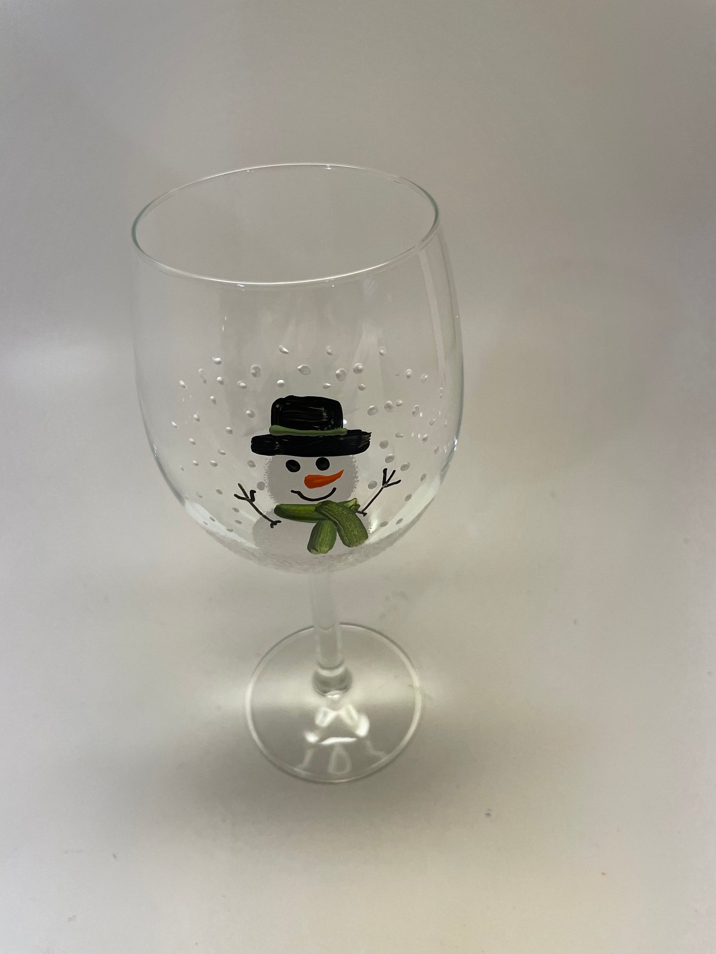Hand Painted Snowman Wine glass with green scarf and hat available in two sizes