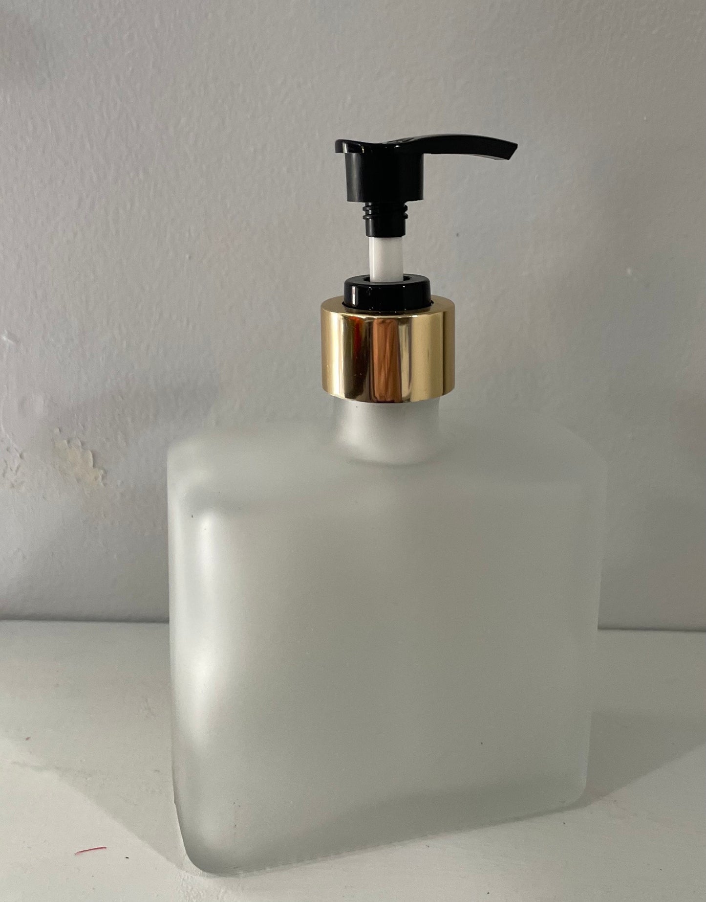 Hand painted Soap or Lotion Dispenser with white and gold flower on both sides of bottle