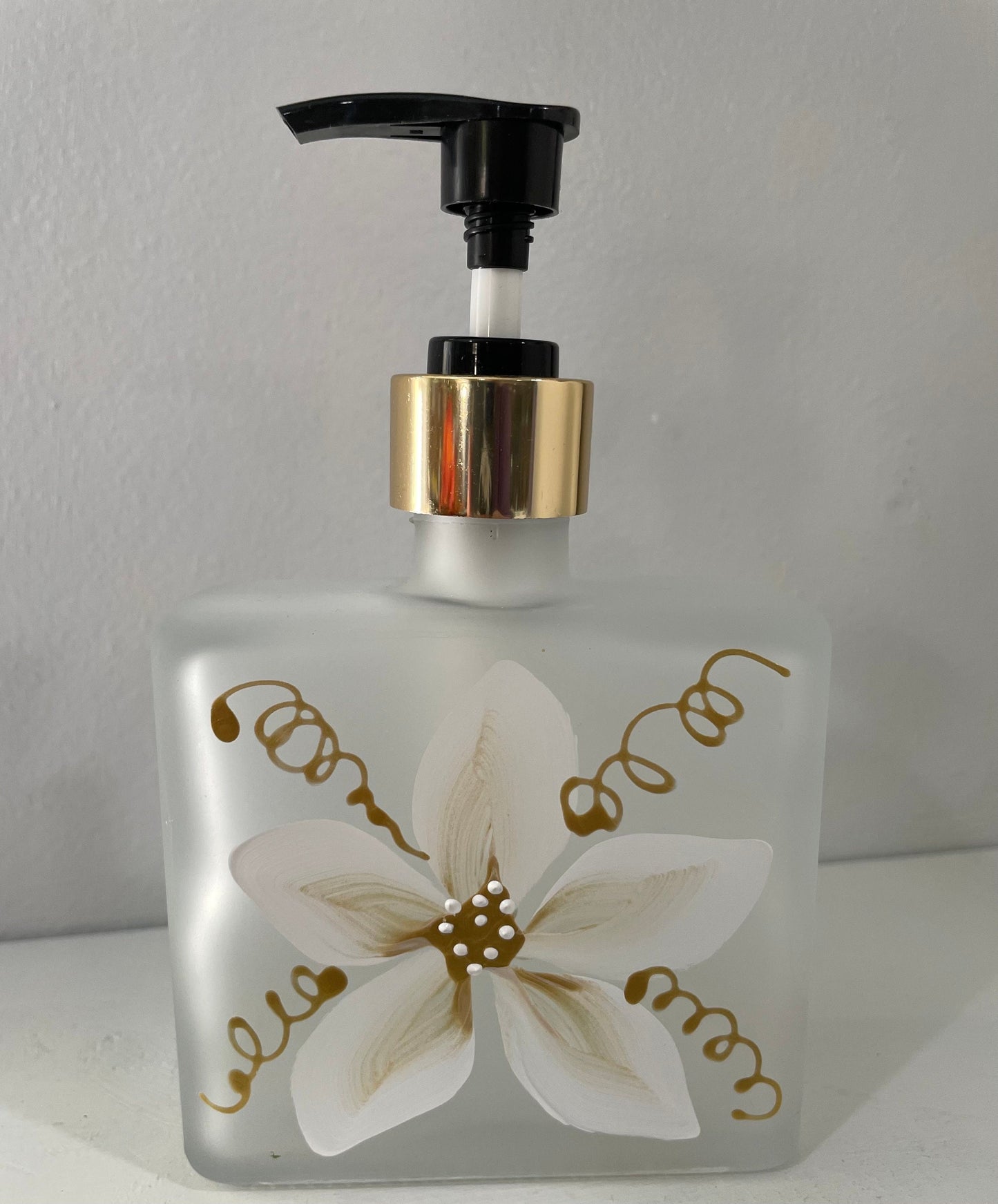 Hand painted Soap or Lotion Dispenser with white and gold flower on both sides of bottle