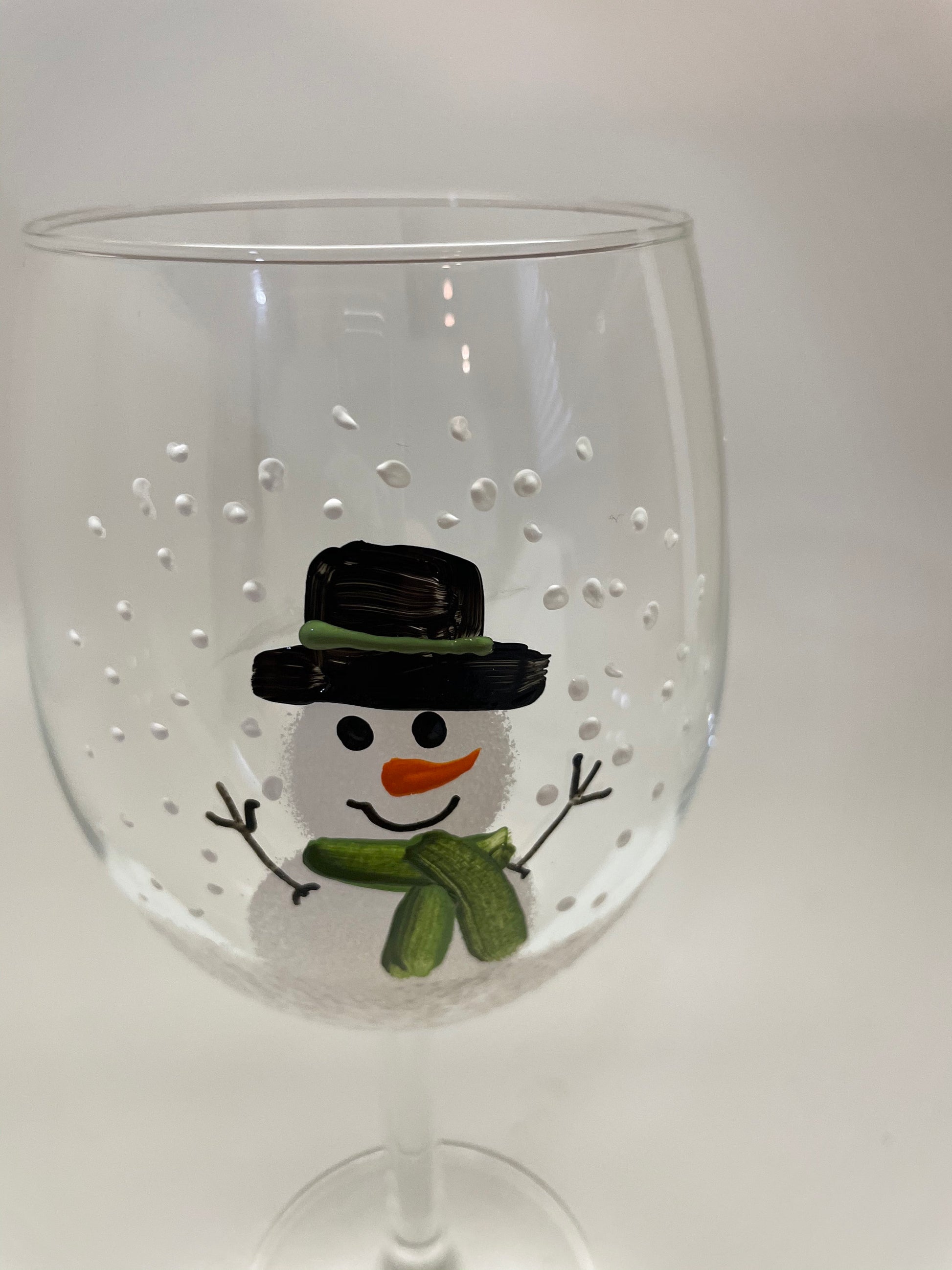 Hand Painted Snowman Wine glass with green scarf and hat available in two sizes